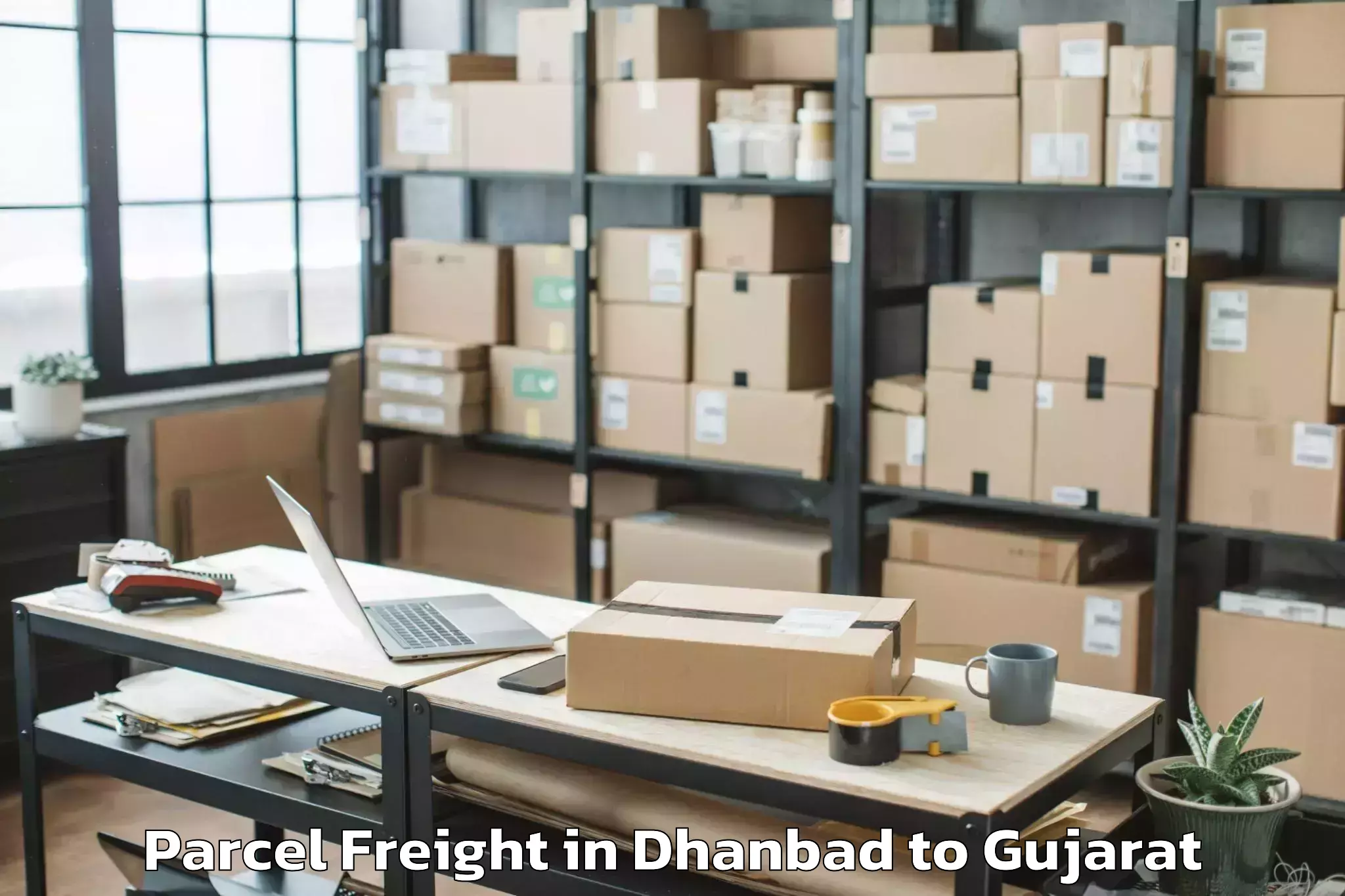 Quality Dhanbad to Kherva Parcel Freight